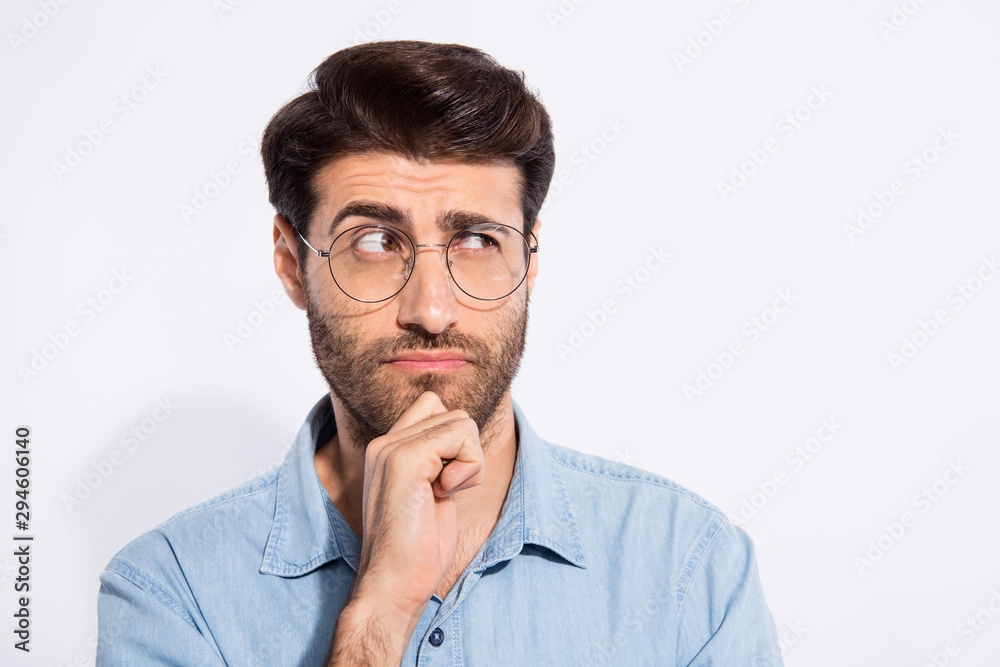 Photo of arabian amazing guy think over important business project speech for seminar wear specs casual denim shirt isolated white color background Photo of arabian amazing guy think over important business project speech for seminar wear specs casual denim shirt isolated white color background