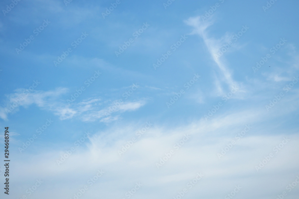 Cirrostratus cloud on beautiful blue sky , Fluffy clouds formations at tropical zone