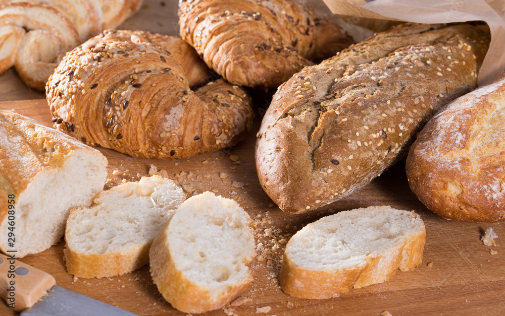 slices of wheaten bread on wooden surface