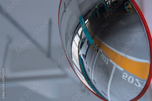 Photos Parking lot reflecting in convex mirror