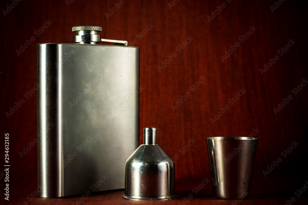 Metallic container for liquid, alcohol, whiskey and cognac. Old classic pocket vessel. Metallic container for liquid, alcohol, whiskey and cognac. Old classic pocket vessel.