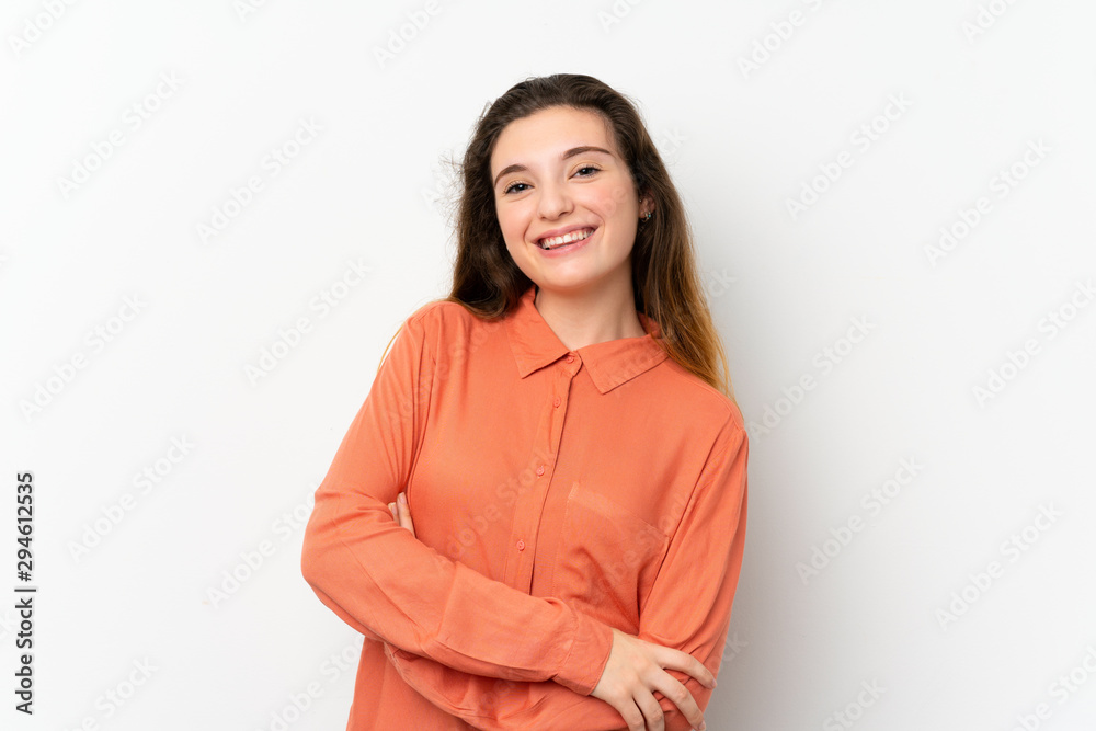 Young brunette girl over isolated white background keeping the arms crossed in frontal position Young brunette girl over isolated white background keeping the arms crossed in frontal position