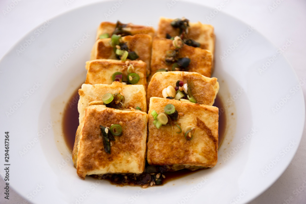 Fried Tofu with Soy Sauce and chillies which is called Dubu Jorim in Korea Fried Tofu with Soy Sauce and chillies which is called Dubu Jorim in Korea