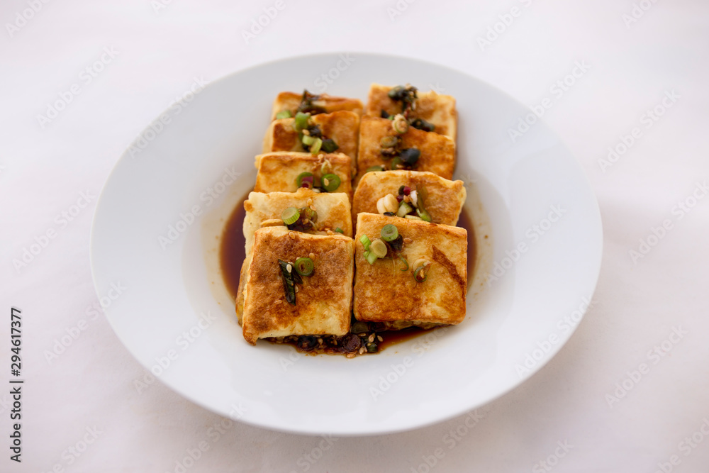Fried Tofu with Soy Sauce and chillies which is called Dubu Jorim in Korea Fried Tofu with Soy Sauce and chillies which is called Dubu Jorim in Korea