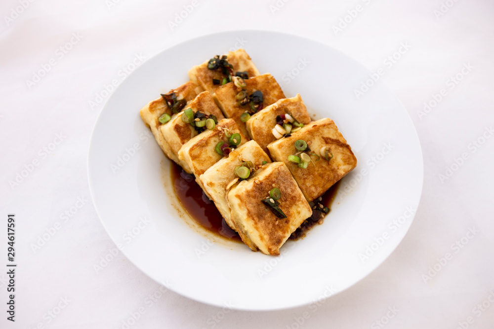 Fried Tofu with Soy Sauce and chillies which is called Dubu Jorim in Korea