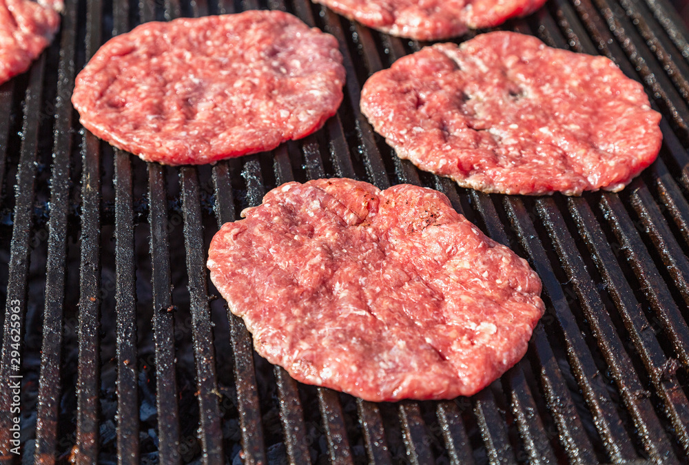 Pieces of grilled meat cooked on the grill