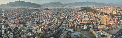 Panoramic view from the drone to the capital of Nepal, Kathmandu. Sunset cityscape in Thamel district, the main tourist and historical district of Kathmandu