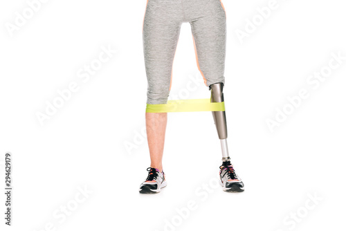 cropped view of disabled sportswoman with resistance band isolated on white © LIGHTFIELD STUDIOS