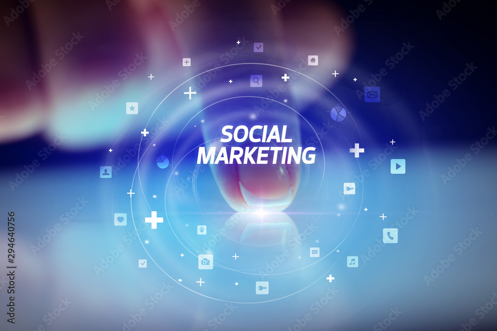 Finger touching tablet with social media icons and SOCIAL MARKETING Finger touching tablet with social media icons and SOCIAL MARKETING