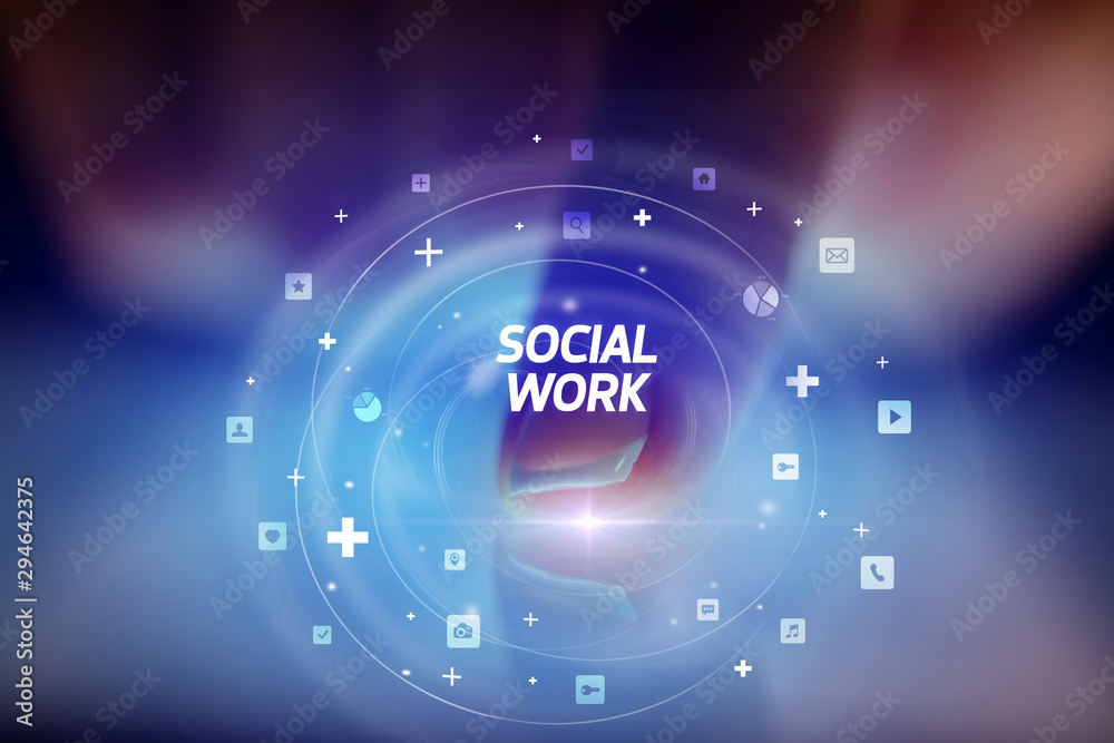 Finger touching tablet with social media icons and SOCIAL WORK