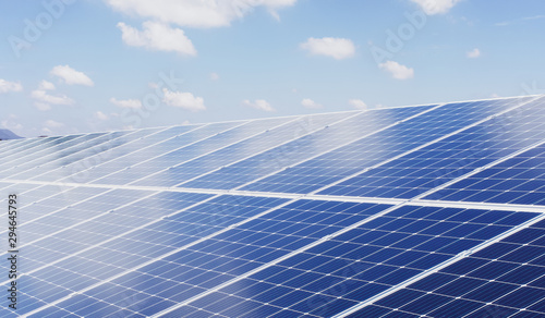 eco technology solar panel with sun and blue sky background. concept clean energy in nature photo