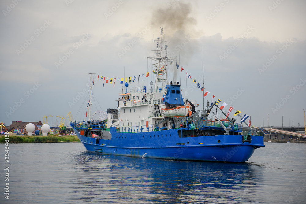 Transport vessels depart from the port to the open Baltic Sea