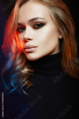 Fototapeta Naklejka Na Ścianę i Meble -  beautiful woman in color lights. colorful girl