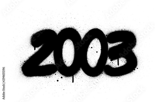 graffiti number 2003 sprayed in black over white