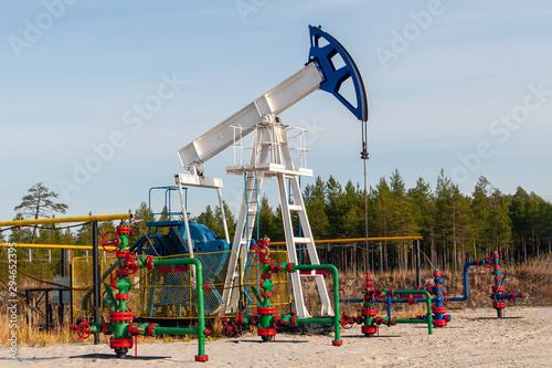 Wallpaper Mural Oil pump on a background of nature. An Oil Pump Jack. Torontodigital.ca