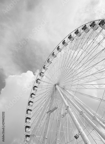 A Constructed Ferris Wheel, Showing the Spindles and Spokes with Passenger Cars on the Fairground Ride, with Cradle Platforms and Ladders for Health and Safety Access or Egress.