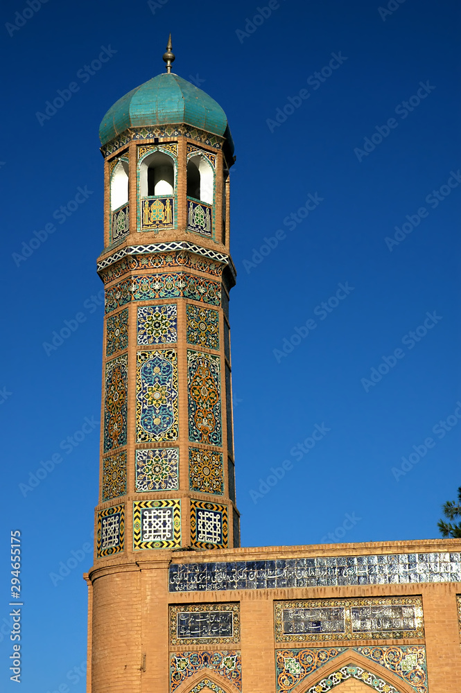 Herat in western Afghanistan. The Great Mosque of Herat (Friday Mosque or Jama Masjid). This is a small minaret on the corner of the mosque with tiling. This mosque is one of the oldest in Afghanistan
