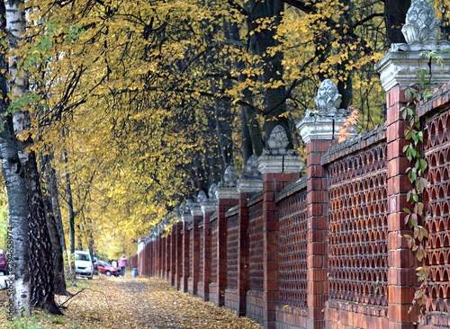 Fototapeta Naklejka Na Ścianę i Meble -  Brick fence.Autumn.