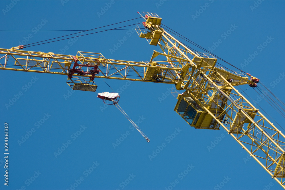 image of a construction crane against the sky image of a construction crane against the sky