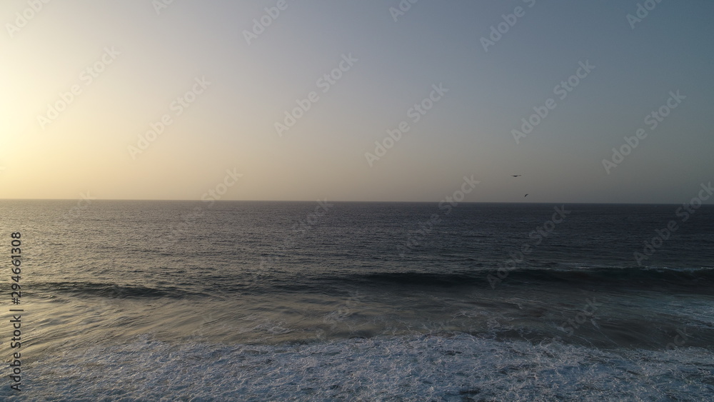 landscape and sunset on the Atlantic coast watching the breaking of the waves