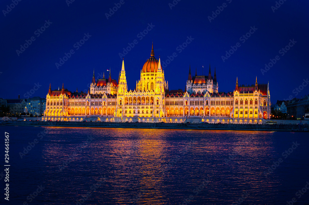 Evening View of Budapest Parliament at sunset, Hungary. Wonderful Cityscape with Colorful sky. Popular travel destination