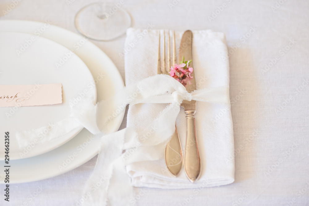 Dishes and cutlery, boho wedding table setting