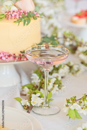 Fruits martini in a festive glass  wedding boho s table closeup