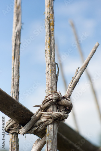 rope tied around fence