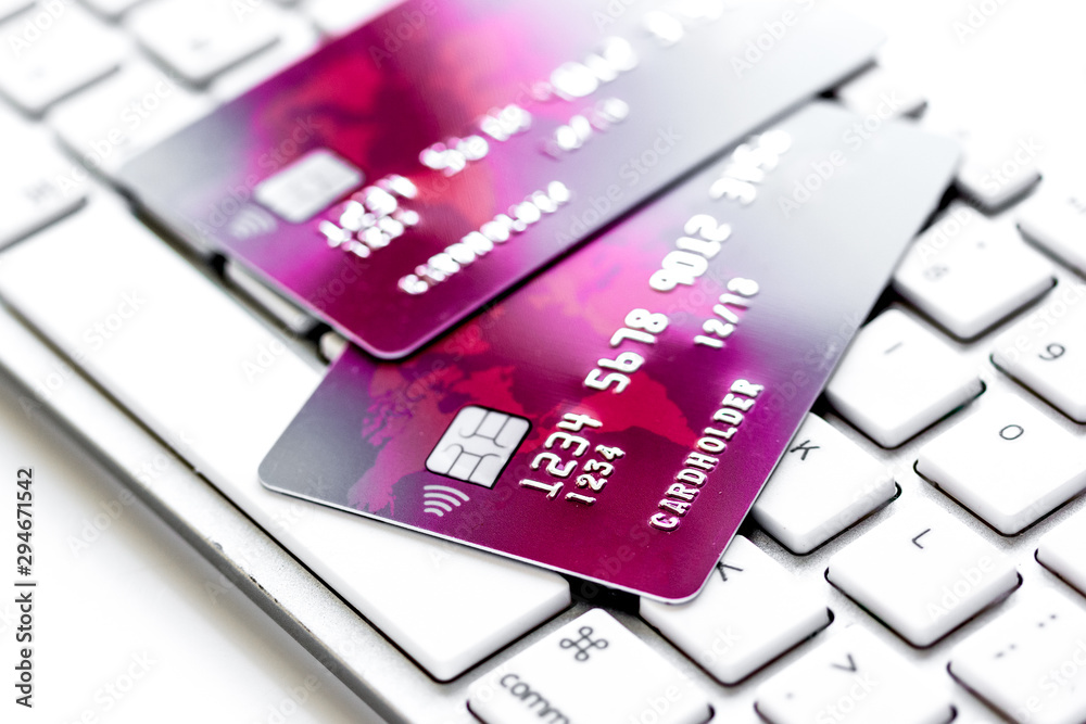 Credit cards on the keyboard close up Credit cards on the keyboard close up