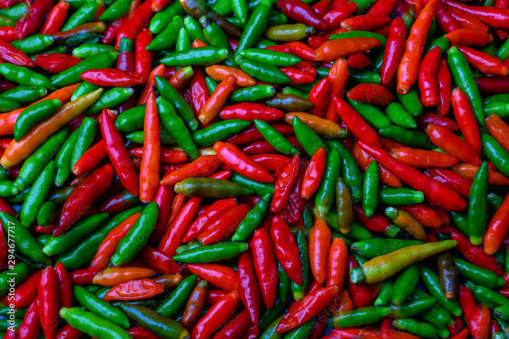 Group of Red Hot chili pepper at black background