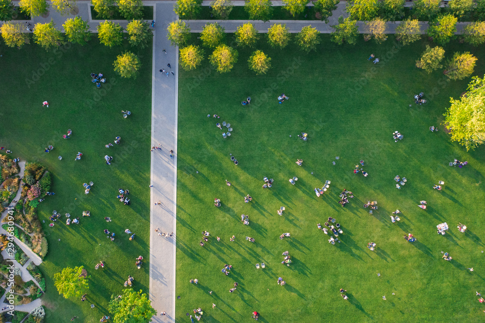 Top view of the many people are resting on the lawn in the park