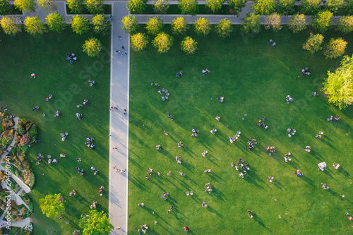 Top view of the many people are resting on the lawn in the park