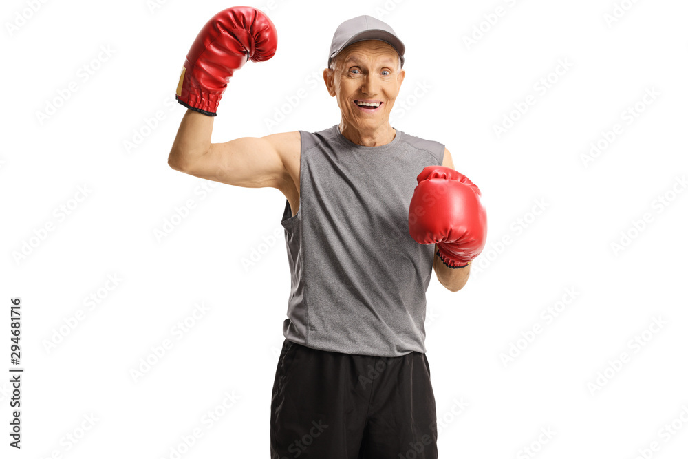 Elderly man with boxing gloves showing muscles Elderly man with boxing gloves showing muscles