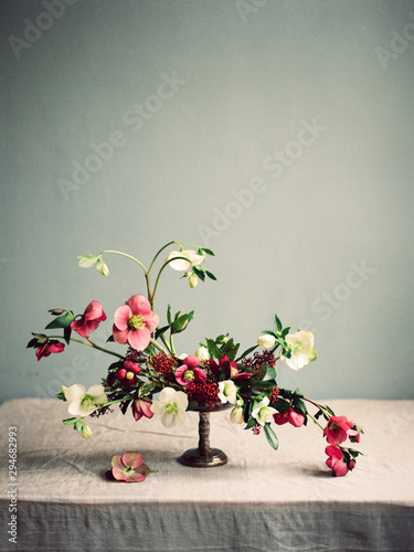 Flowers composition on table photo