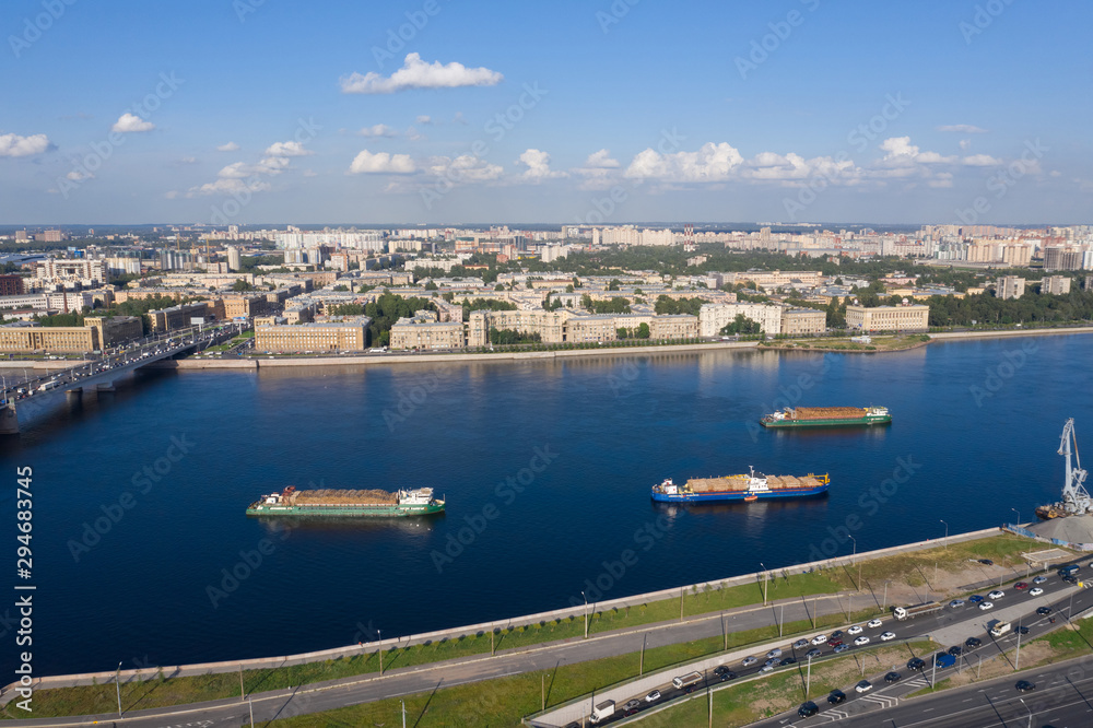Cargo ships on the Neva in St. Petersburg.