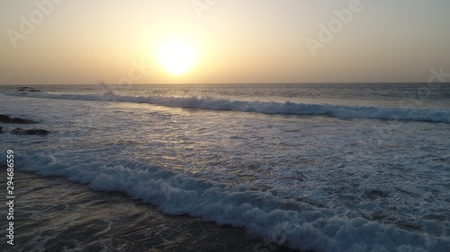 landscape and sunset on the Atlantic coast watching the breaking of the waves