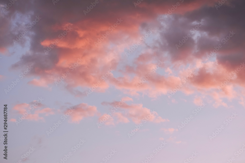 Colorful clouds on sunset sky, nature background