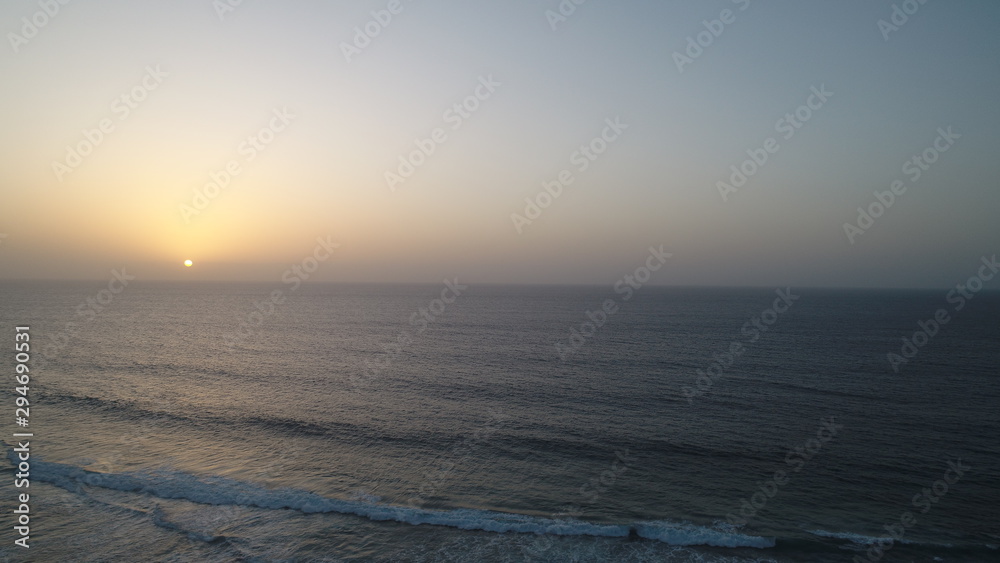 landscape and sunset on the Atlantic coast watching the breaking of the waves