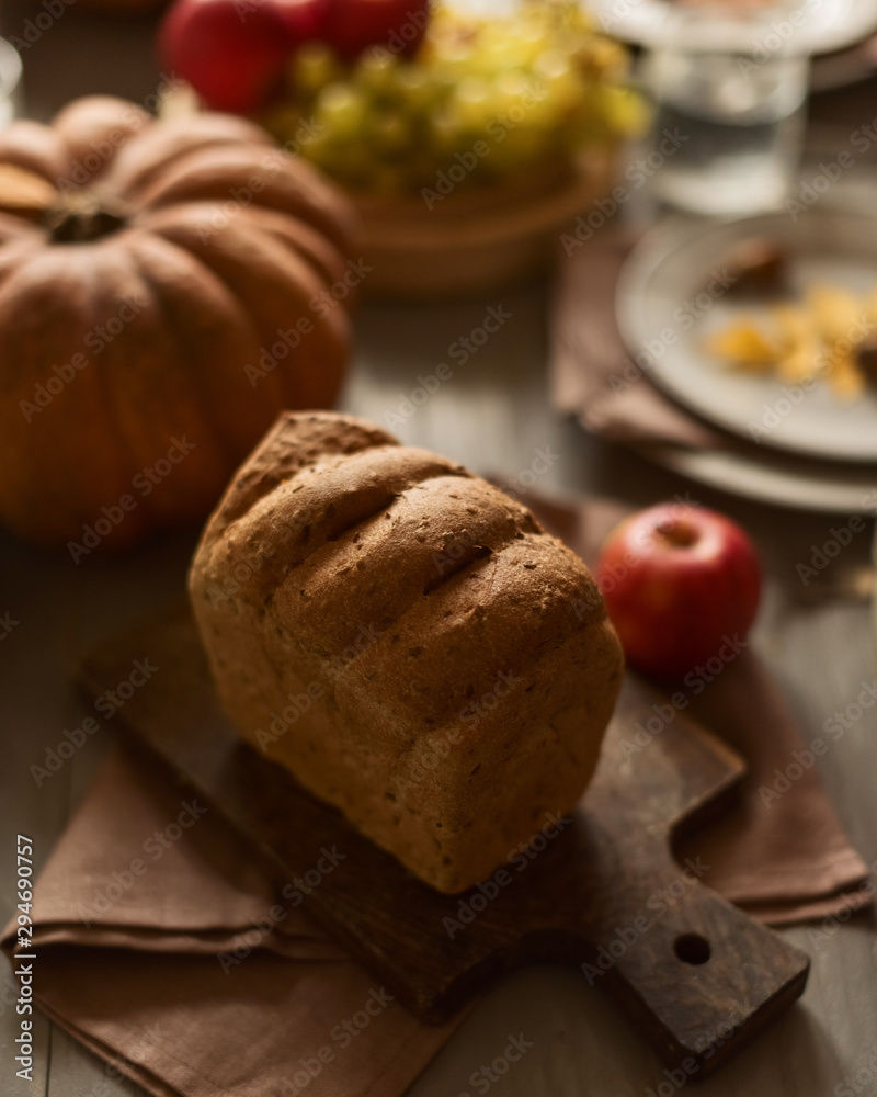 Whole grain bread on a festive autumn table
