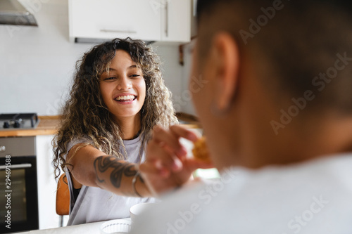Two lovers having fun together for breakfast