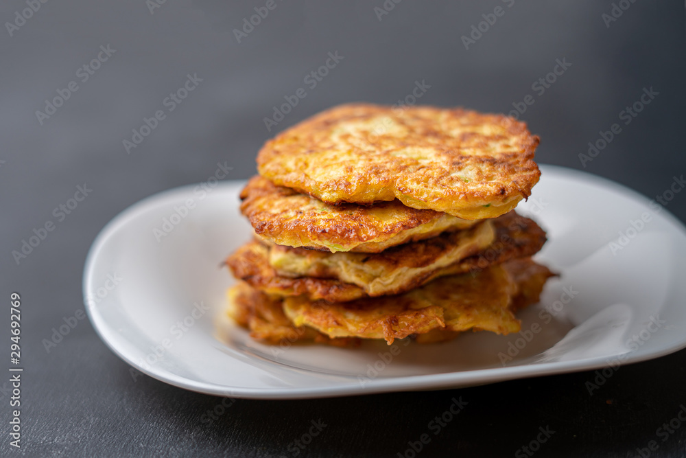 a stack of pancake cheesecakes in the plate