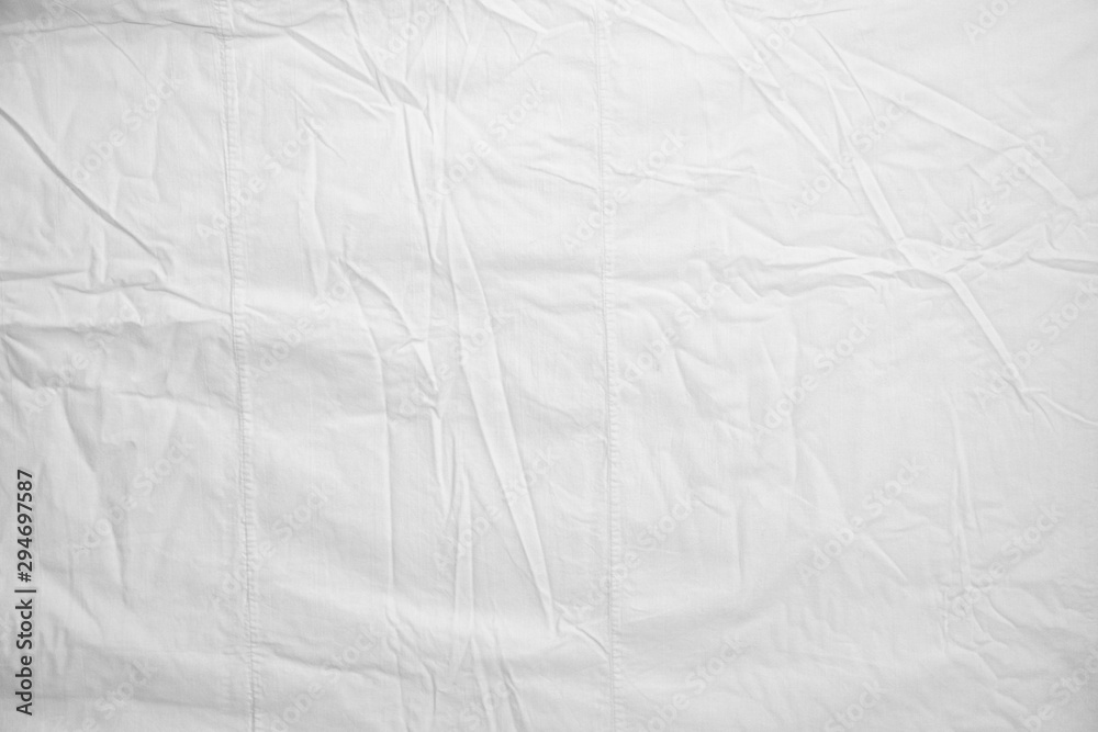 White Crumpled Bed Sheet Background Texture. white fabric top view. pleats  on light fabric Stock Photo | Adobe Stock