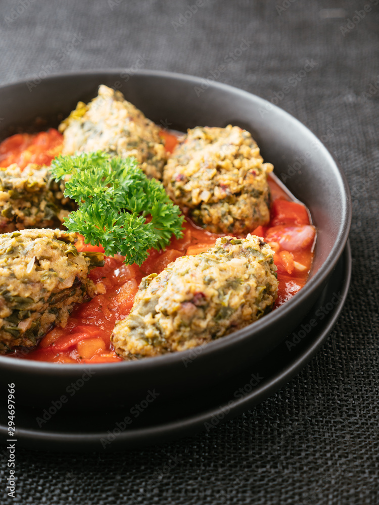 Malabar Spinach Dumplings in Tomato and Bell Pepper Sauce Malabar Spinach Dumplings in Tomato and Bell Pepper Sauce