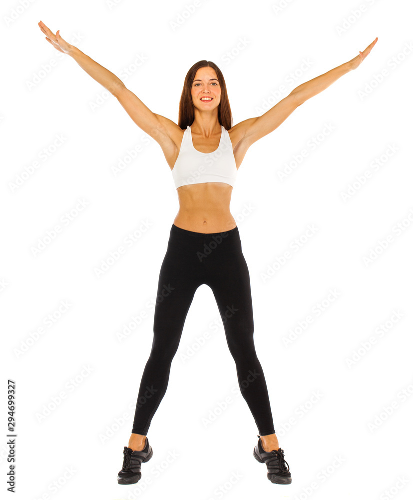 Sexy fitness woman posing in studio - isolated on a white background Sexy fitness woman posing in studio - isolated on a white background