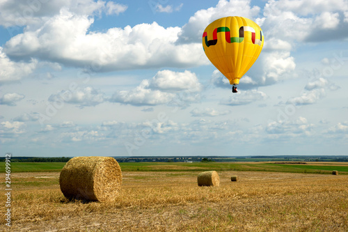 Balloons fly high above the fields.