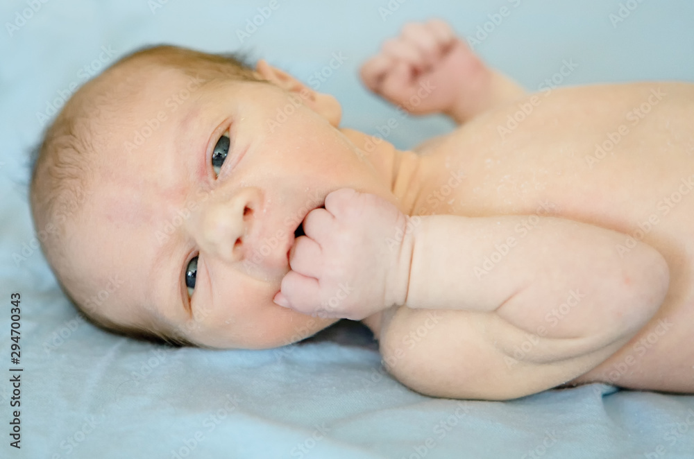 Lying on the bed sheet baby at home Lying on the bed sheet baby at home