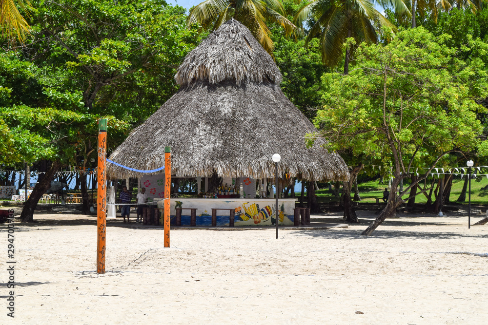 bar and volleyball field on a beach in the caribbean sea bar and volleyball field on a beach in the caribbean sea