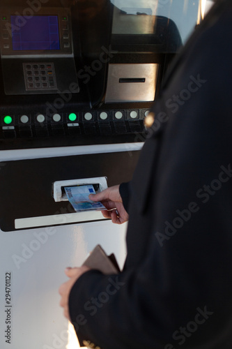 Man paying at the gas station photo