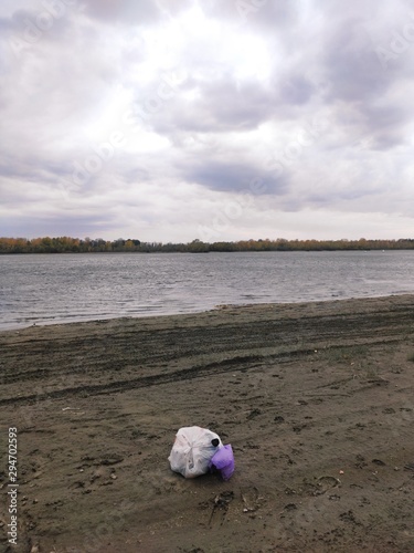 Obraz na płótnie Rubbish on the river bank