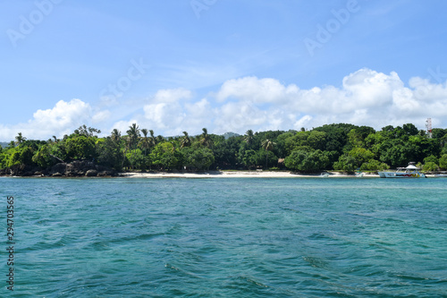 island in the carribean sea with white beach © Laila